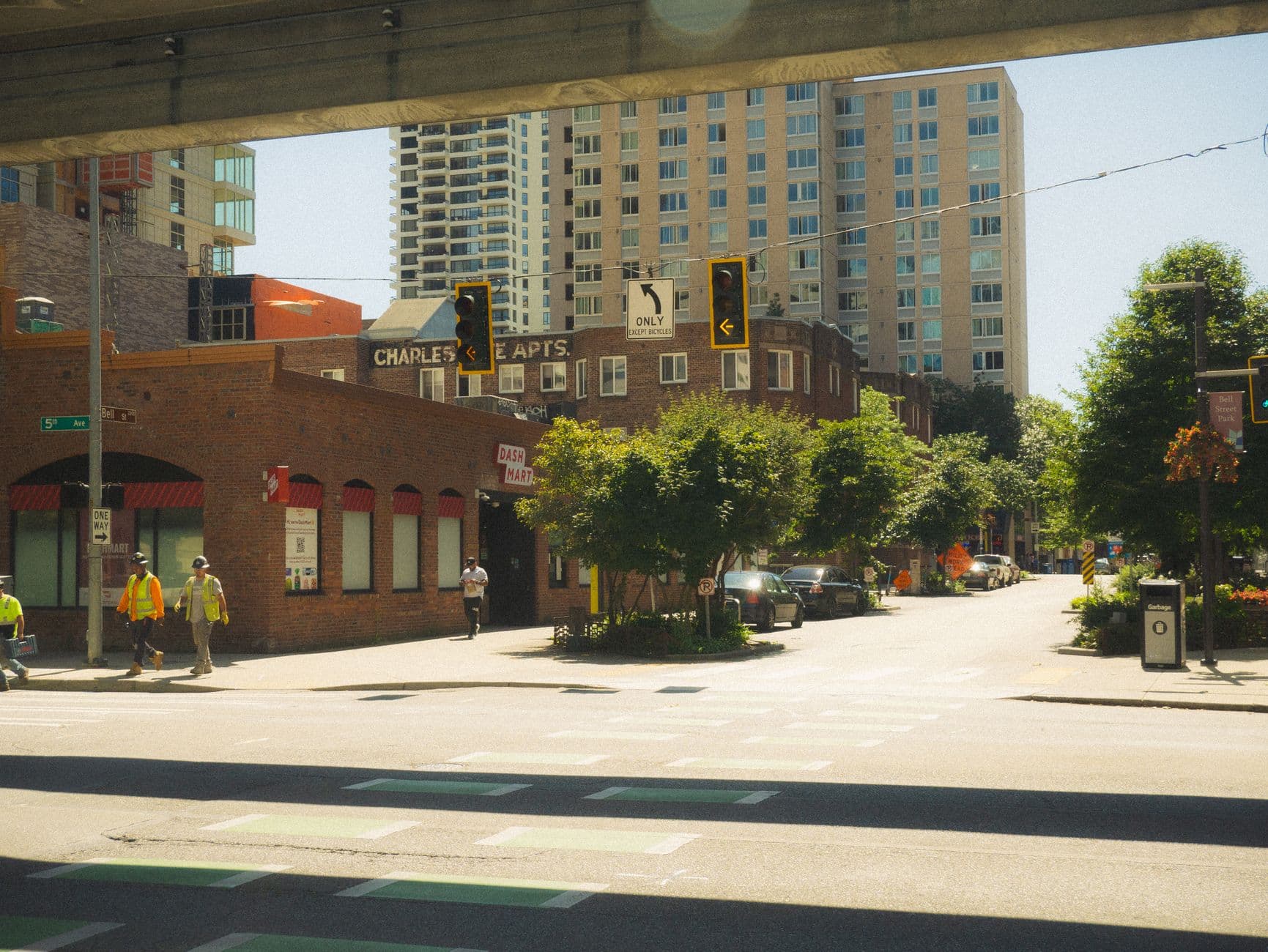 City street view capturing a sunny day in Seattle with classic architecture.